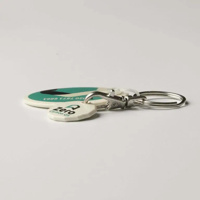 Promotional biodegradable trolley mate oval keyring in white with printed logo