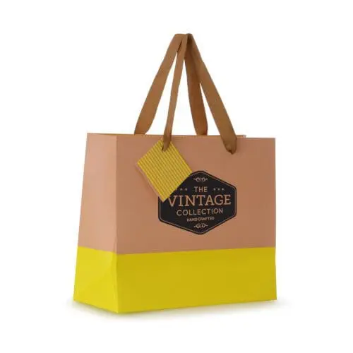 Promotional paper gift bag in yellow with printed logo