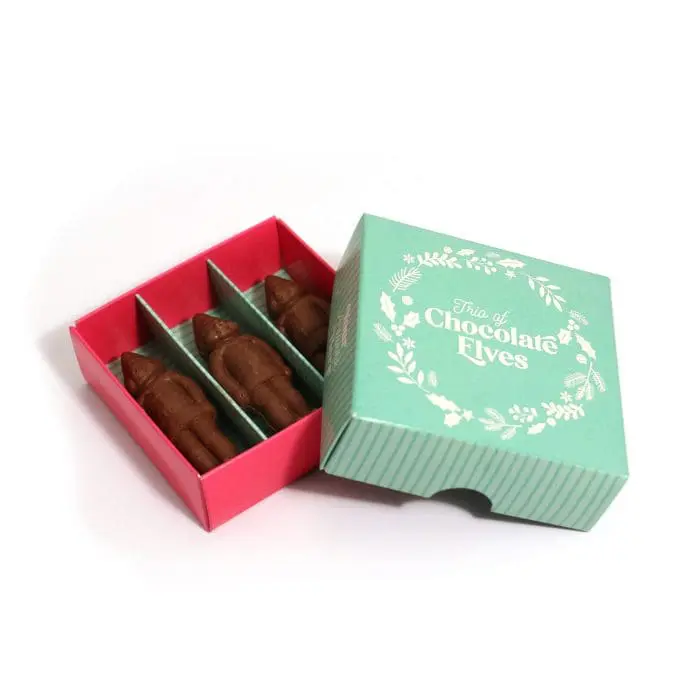 Branded lidded chocolate box containing three chocolate elves