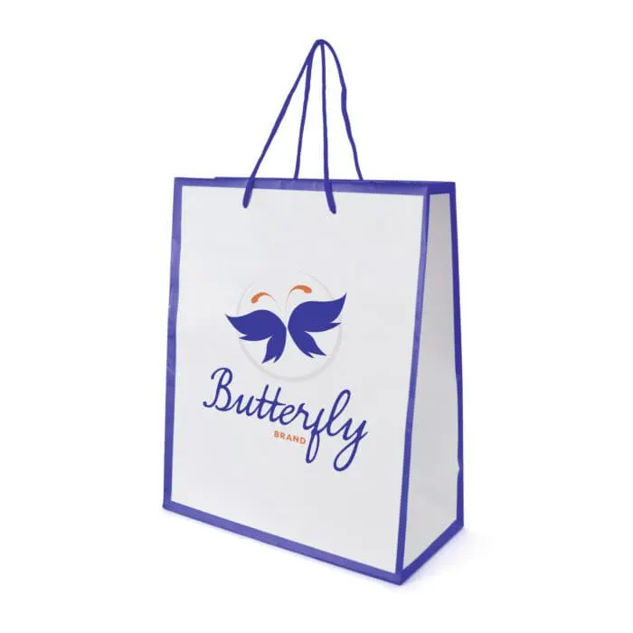 Promotional glossy paper bag in white with blue handles and trim with printed logo