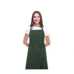 Branded Orissa GOTS Organic Cotton Apron in green being worn