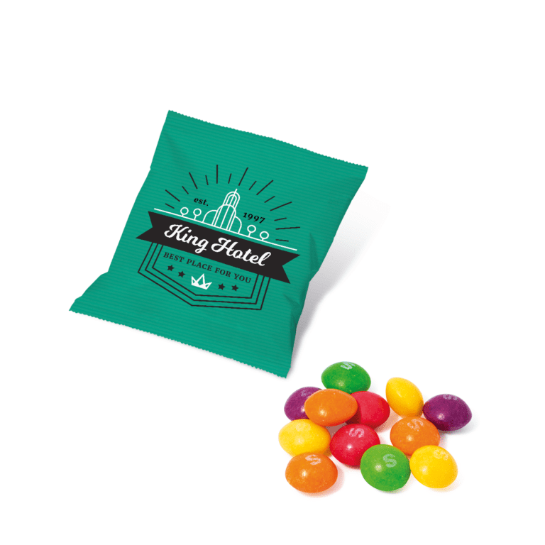 Branded paper flow bag with Skittles sweets and printed logo