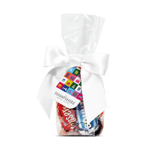 Promotional swing tag bag with Celebrations and printed logo card with white ribbon bow