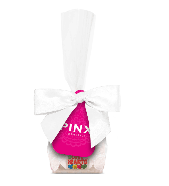 Promotional swing tag bag with Love Hearts and printed logo card with white ribbon bow