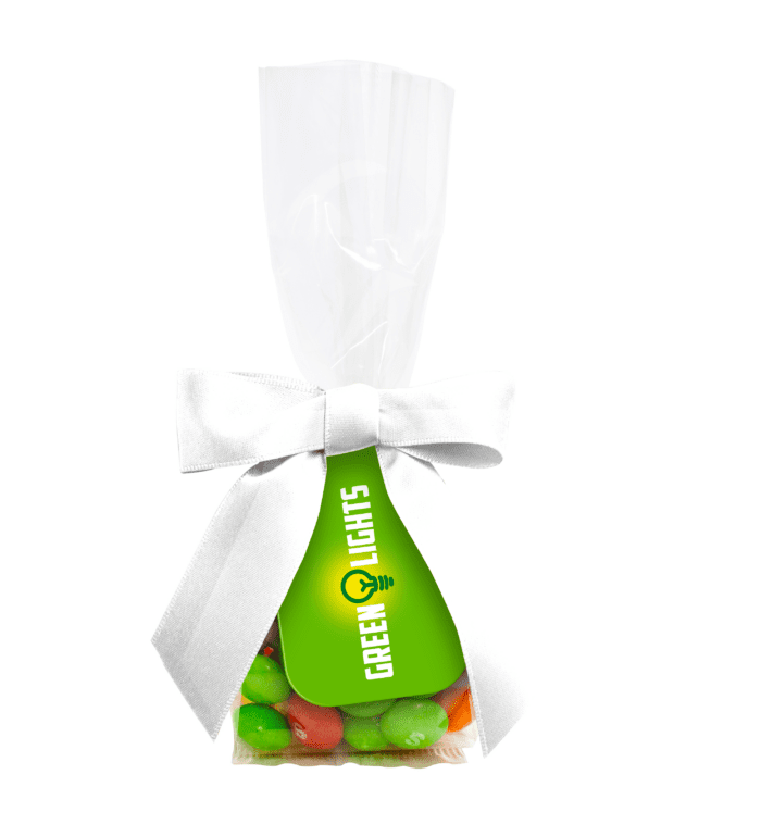 Promotional swing tag bag with Skittles and printed logo card with white ribbon bow