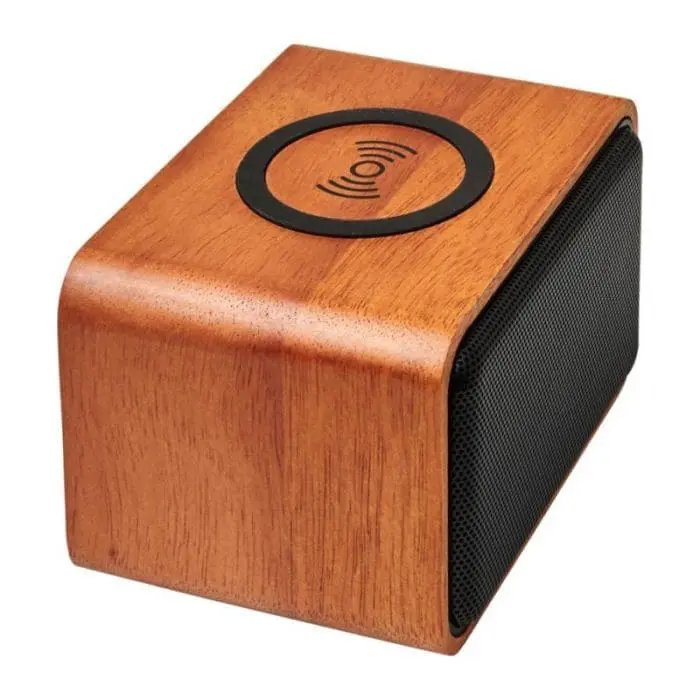 Custom-branded wooden speaker with wireless charging pad and printed logo