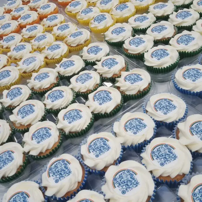 Branded Logo Frosted Cupcakes in coloured paper case and printed with logo or design