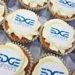 Branded Logo Frosted Cupcakes in coloured paper case and printed with logo or design