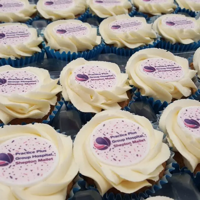 Branded Logo Frosted Cupcakes in coloured paper case and printed with logo or design